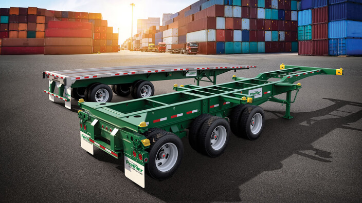 Premier flatbed and chassis in a parking lot